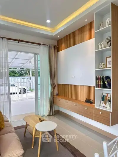 Modern living room with stylish wood paneling and cozy furniture
