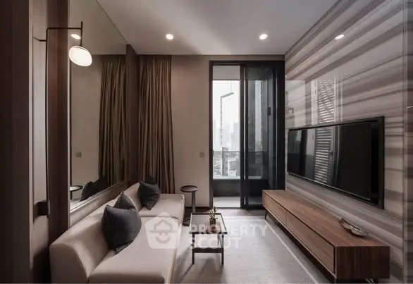 Modern living room with sleek design, large TV, and balcony access in luxury apartment.