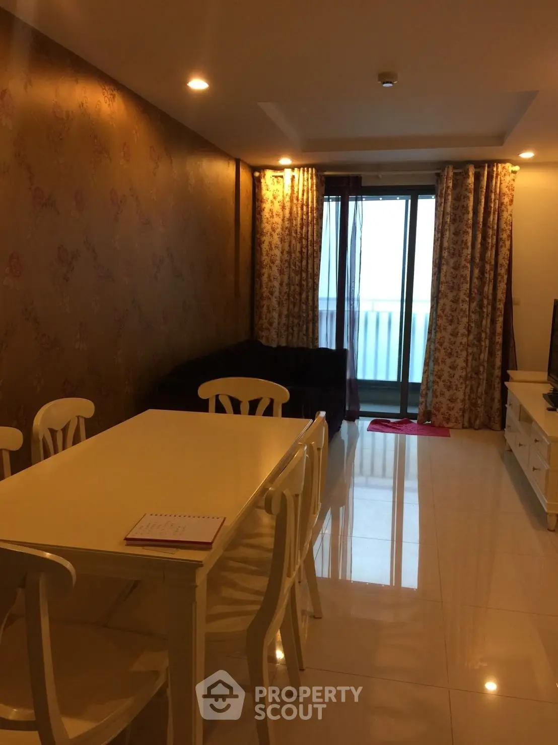 Cozy living room with elegant dining area and stylish decor