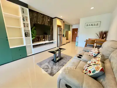 Spacious modern living room with sleek design and cozy seating area