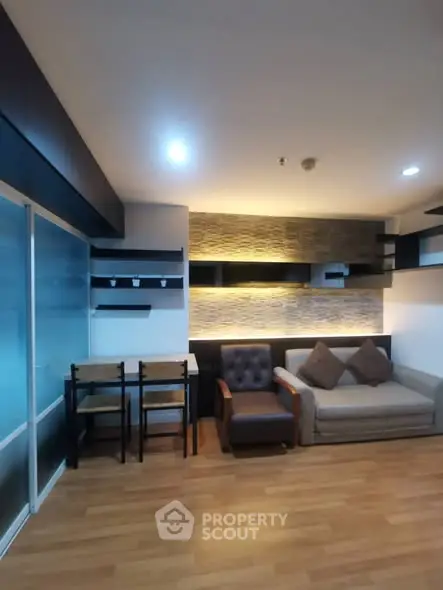 Modern living room with stylish lighting and cozy seating area