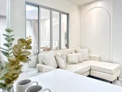 Stylish modern living room with cozy sectional sofa and elegant decor