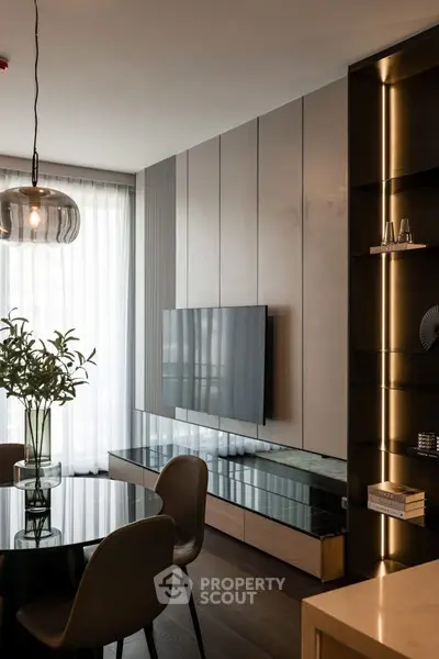 Modern living room with sleek TV unit and elegant decor