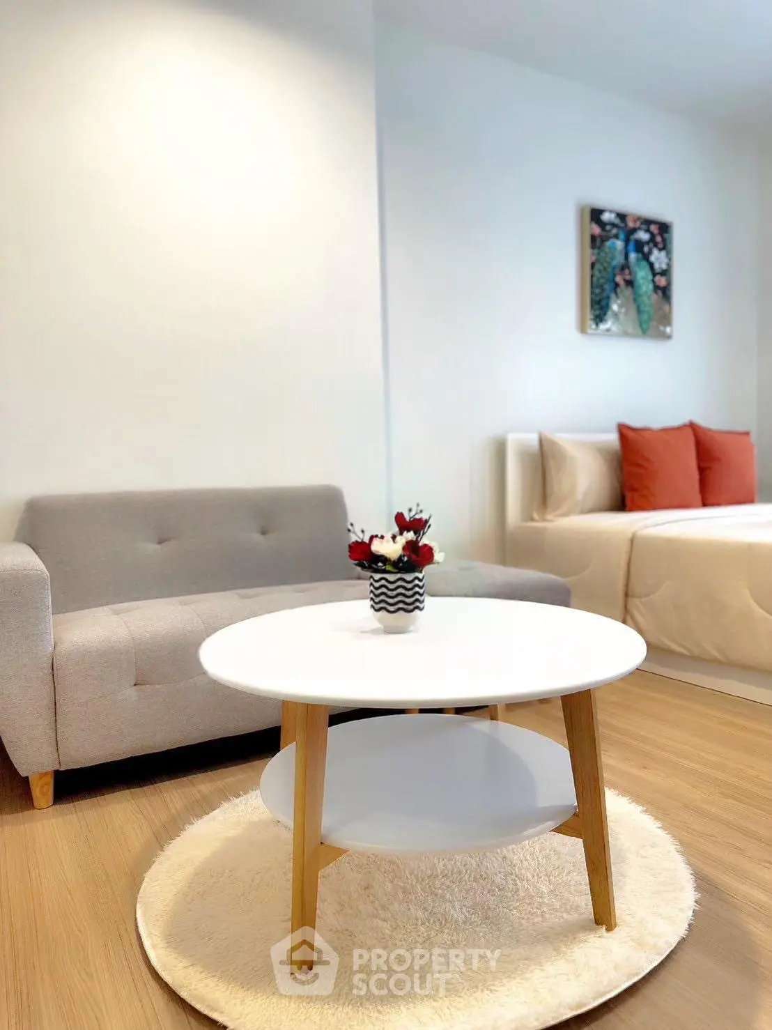 Modern studio apartment with cozy living area and stylish decor
