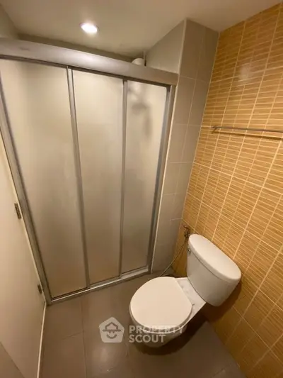 Modern bathroom with sleek shower and contemporary tile design