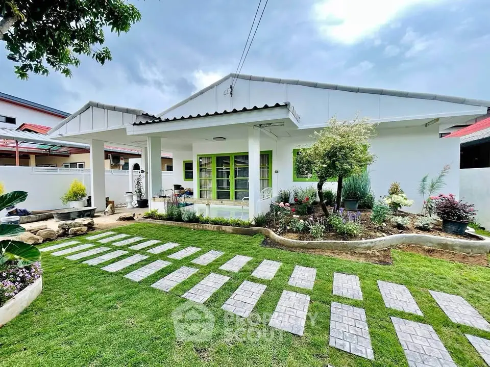 Charming single-story home with lush garden and modern design in a serene neighborhood.
