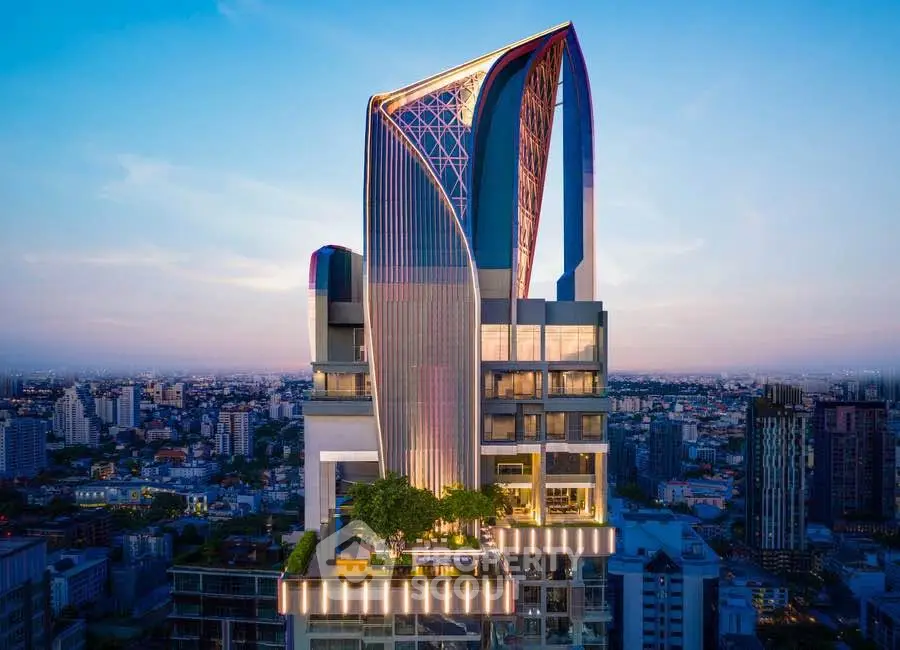 Stunning modern skyscraper with unique architectural design and panoramic city views at sunset.