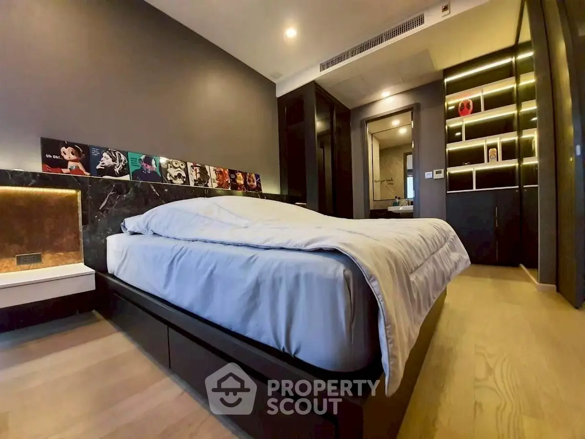 Luxurious modern bedroom with sleek design and ambient lighting