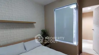 Cozy bedroom with modern decor and ensuite bathroom