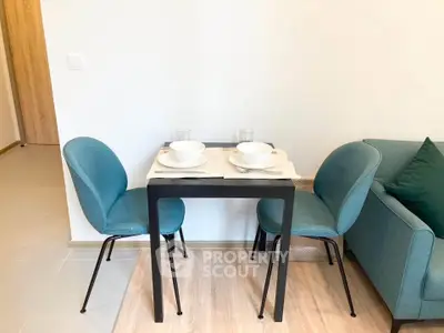 Cozy dining area with modern chairs and table in stylish apartment