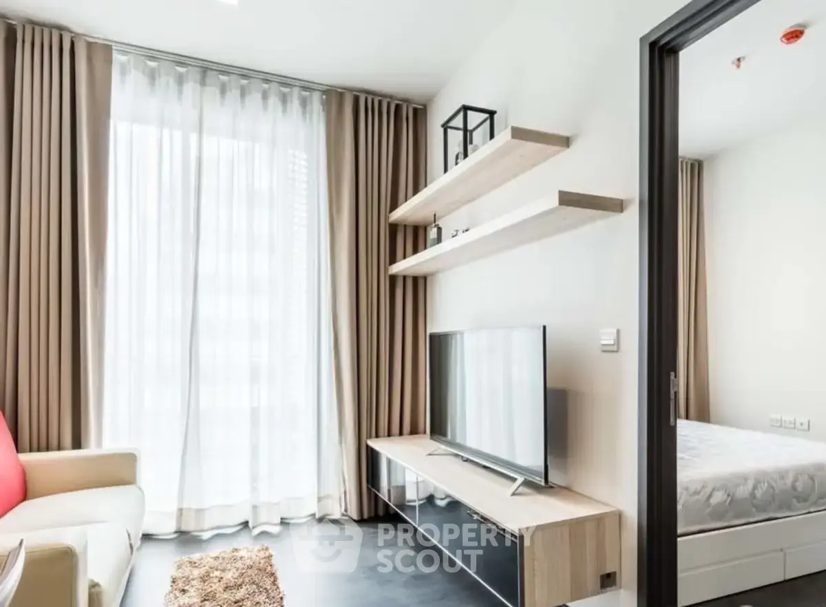 Modern living room with sleek TV unit and cozy decor