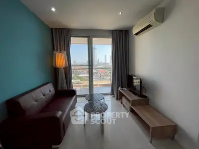 Modern living room with balcony view in high-rise apartment