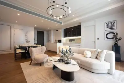 Luxurious open-plan living room with modern decor and elegant lighting