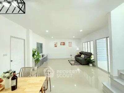 Spacious modern living room with elegant decor and natural light
