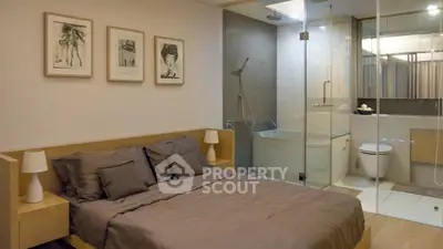 Modern bedroom with ensuite glass-walled bathroom and stylish decor