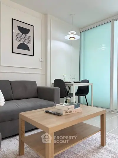 Modern living room with stylish decor and cozy seating area