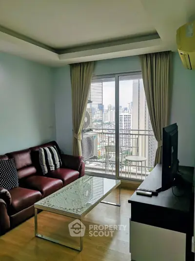 Modern living room with city view and stylish furniture in high-rise apartment