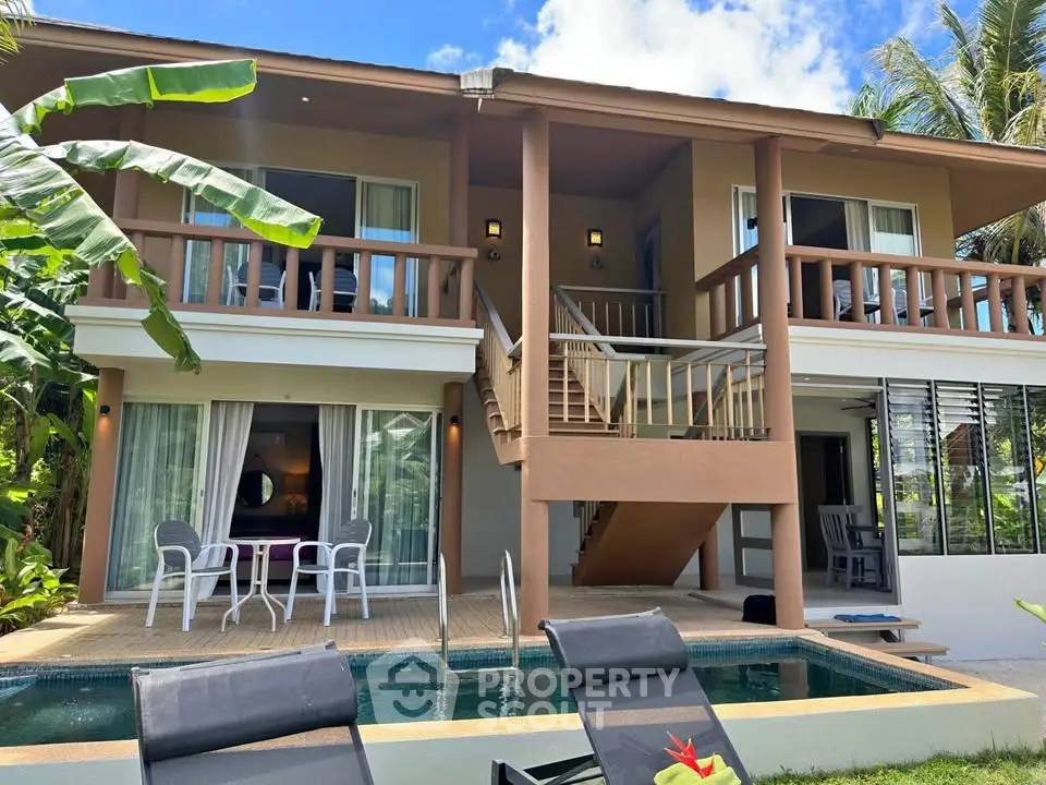 Stunning tropical villa with private pool and spacious balcony, perfect for luxurious island living.