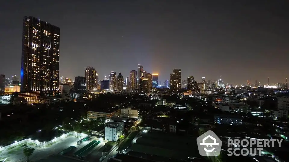 Stunning night cityscape view with illuminated skyscrapers and vibrant urban skyline.