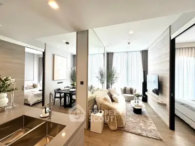 Luxurious open-plan living room with modern decor and natural light