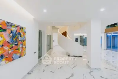 Luxurious modern interior with elegant spiral staircase and marble flooring