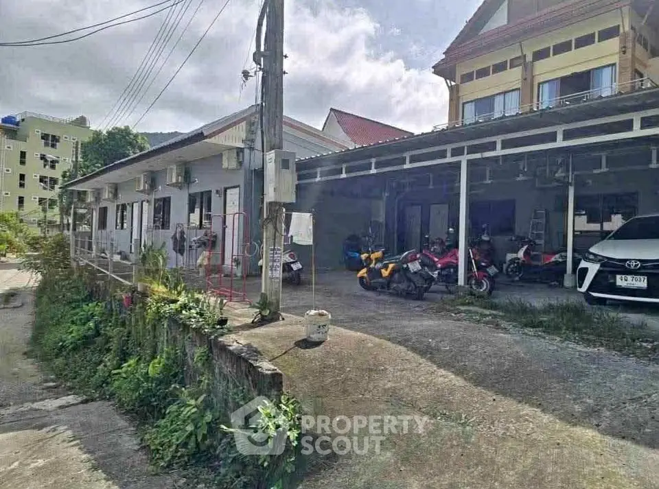 Charming residential property with parking and motorbike area in a serene neighborhood.