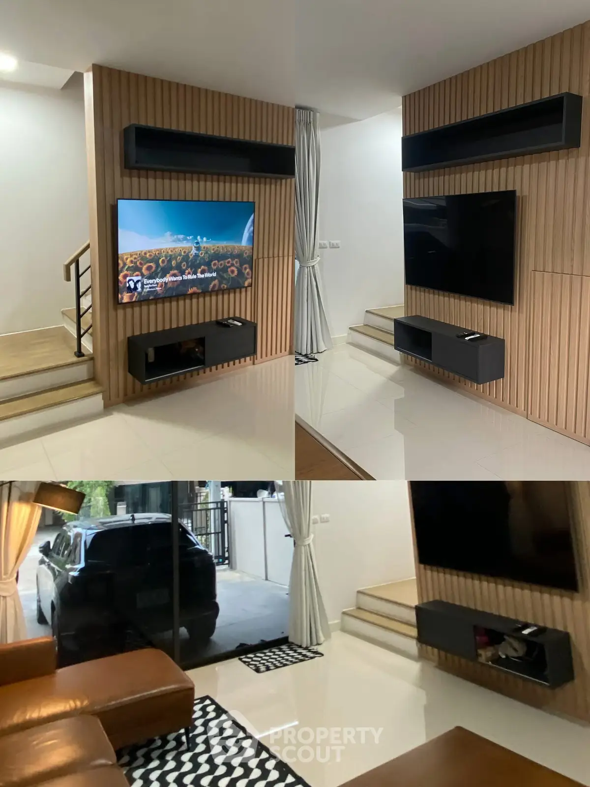 Modern living room with sleek TV setup and stylish wooden paneling