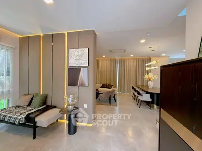 Luxurious modern living room with elegant decor and ambient lighting