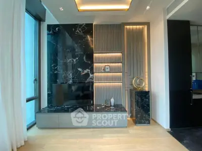 Luxurious modern living room with elegant marble accents and ambient lighting