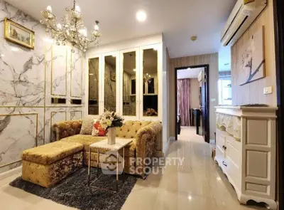 Luxurious living room with elegant decor and plush furniture in a modern apartment.