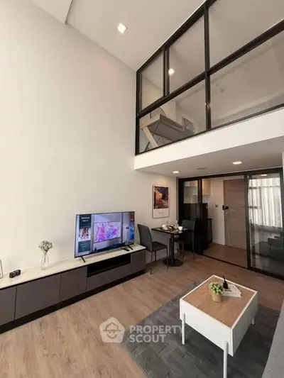 Modern duplex living room with high ceiling and stylish decor