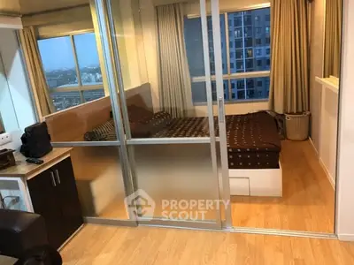 Modern studio apartment with glass partition and city view