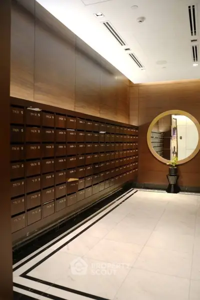 Luxurious apartment lobby with elegant mailboxes and modern decor