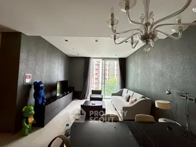 Modern living room with stylish decor and large window view