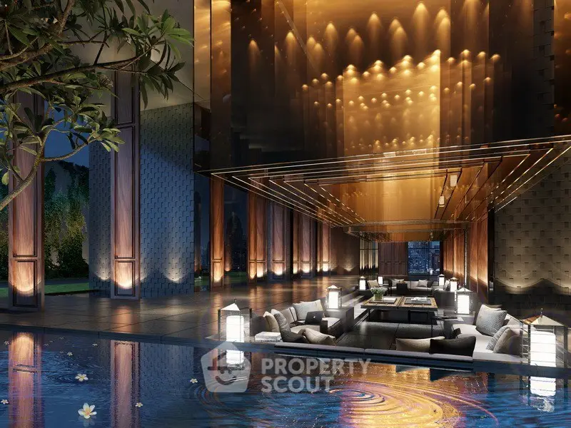 Luxurious outdoor seating area with ambient lighting by a serene pool at night.