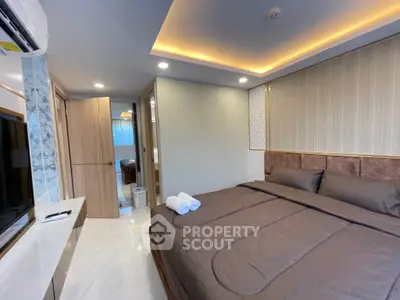 Luxurious bedroom with modern design and ambient lighting