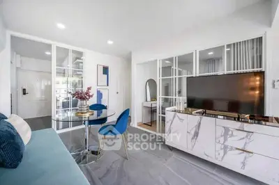 Modern living room with stylish decor and marble TV stand