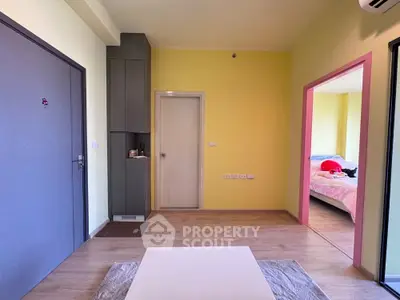 Cozy apartment interior with vibrant yellow walls and modern furnishings