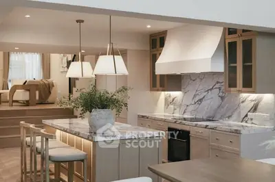 Luxurious open kitchen with marble countertops and elegant lighting in modern home