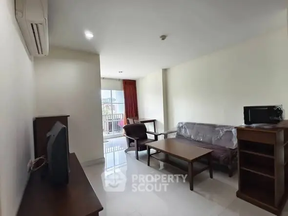 Spacious living room with modern furniture and natural light