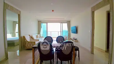 Luxurious living room with ocean view and elegant dining area