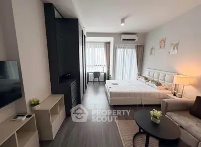 Modern studio apartment with stylish decor and natural light