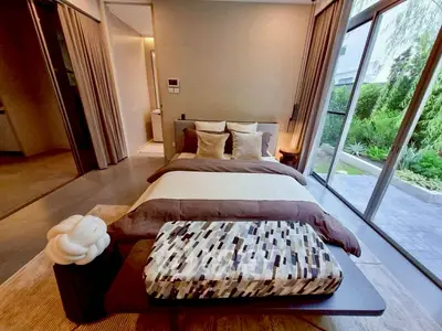 Luxurious bedroom with garden view and modern decor