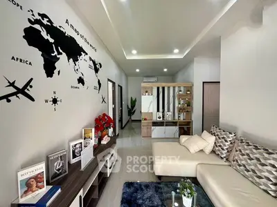 Modern living room with world map wall art and stylish decor