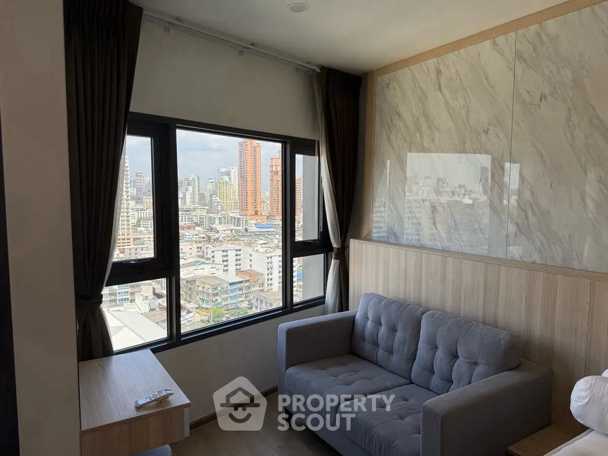 Modern living room with city view and stylish decor