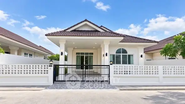 Charming single-story home with modern architecture and spacious front yard in a serene neighborhood.
