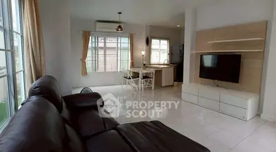 Spacious living room with modern furniture and natural light