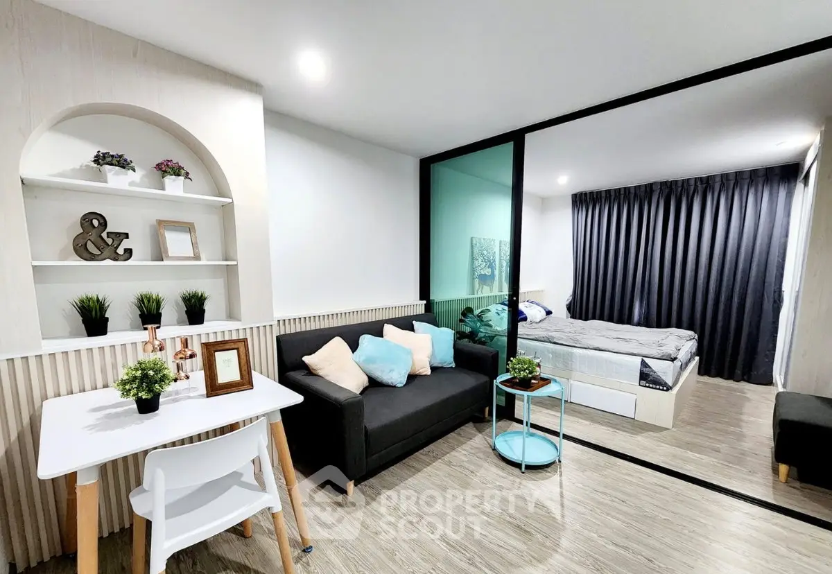 Modern studio apartment with stylish decor and cozy living area