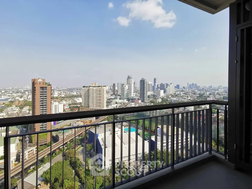 Stunning cityscape view from a high-rise balcony, perfect for urban living.