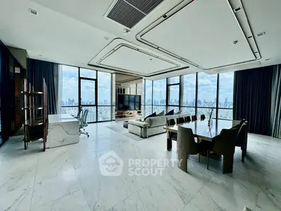 Luxurious living room with panoramic city views and modern furnishings